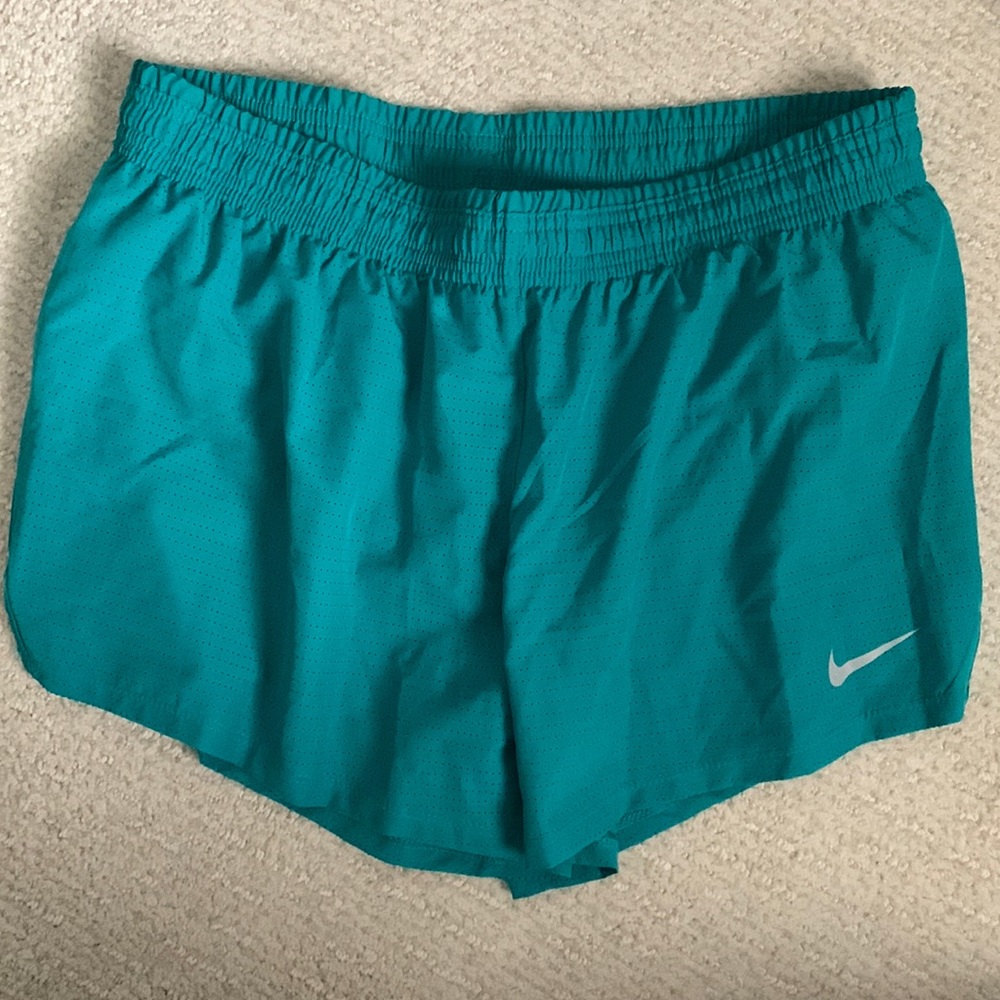 Nike teal dri-fit running shorts